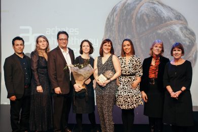 8 people line up for photograph as Candoco receives award